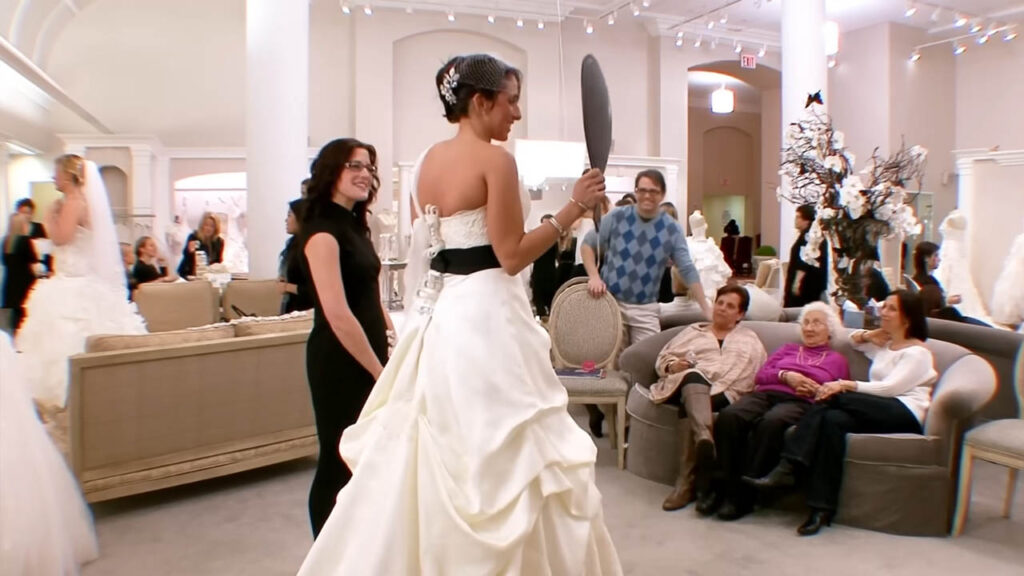 Happy bride blowing her budget without needing wedding financing options.