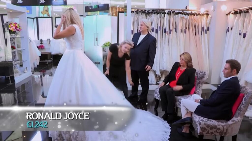 Bride Rebecca looks stunning in her first A-line wedding dress at Kleinfeld