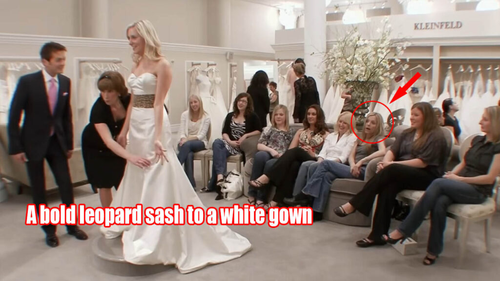 White wedding dress with a leopard print sash