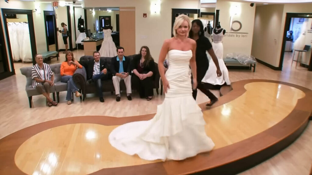 Toxic friends and pageant directors judging bridal fitness and dresses like a Miss America competition.
