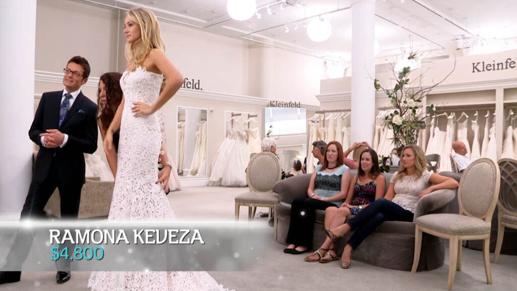 Whitney tries on a stunning Ramona Keveza lace gown on Say Yes To The Dress