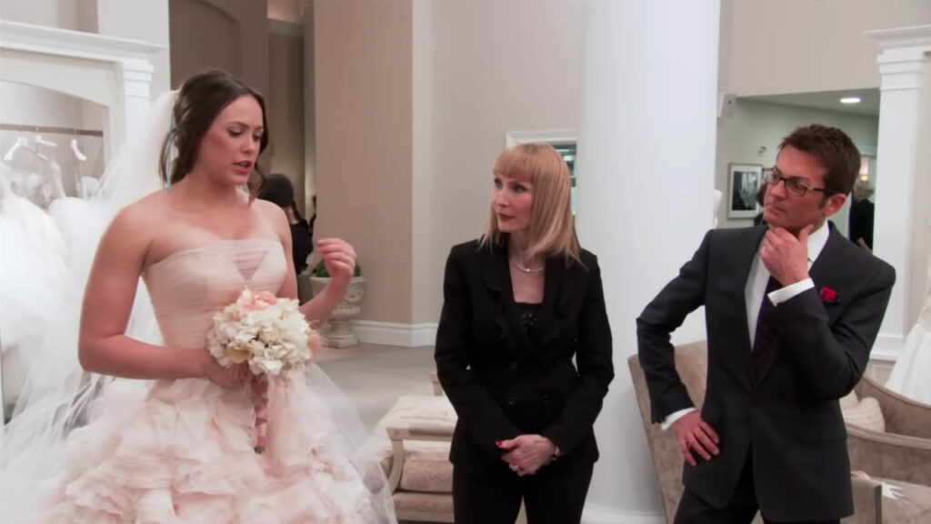 Bride getting cold feet during custom bridal fittings.