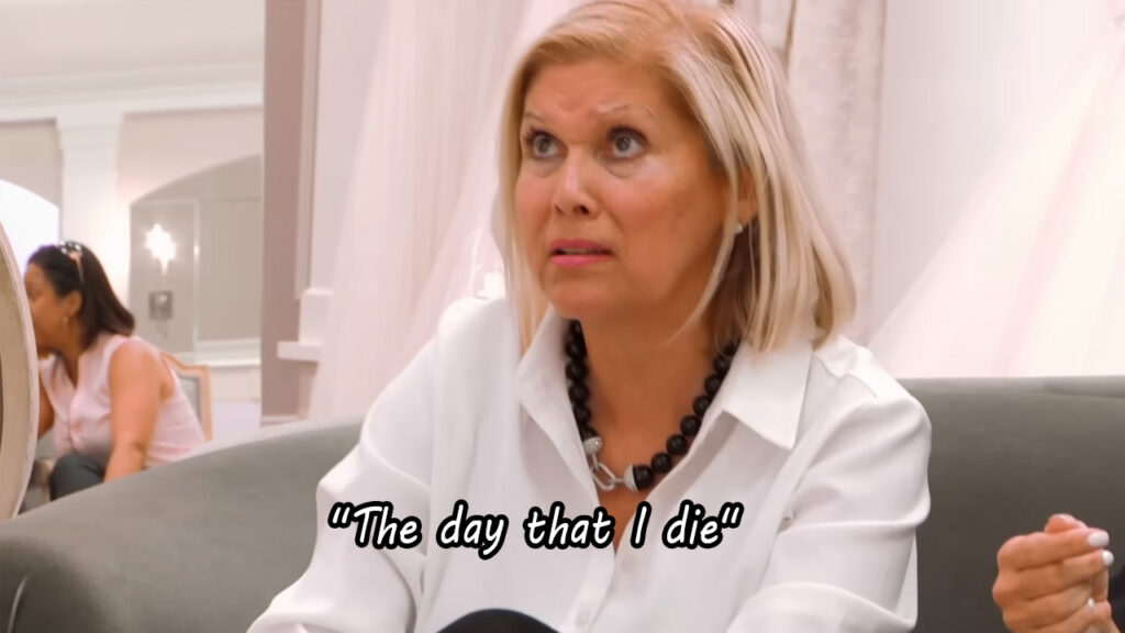 Mother using emotional blackmail on her daughter at a luxury bridal salon.